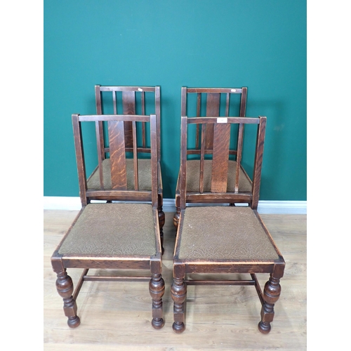 747 - A set of four oak Dining Chairs with baluster turned supports and an octagonal Table