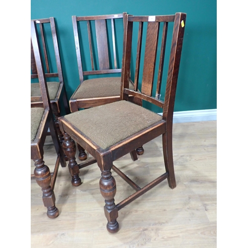 747 - A set of four oak Dining Chairs with baluster turned supports and an octagonal Table