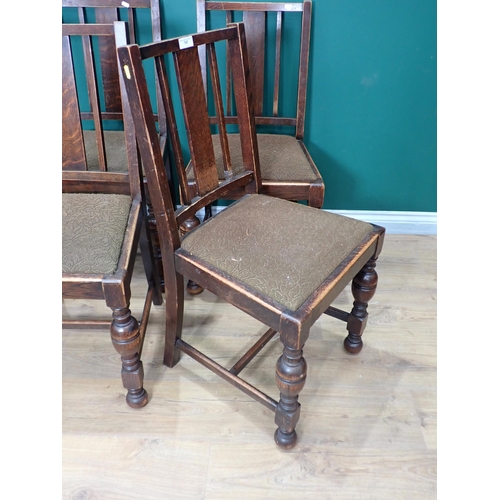 747 - A set of four oak Dining Chairs with baluster turned supports and an octagonal Table