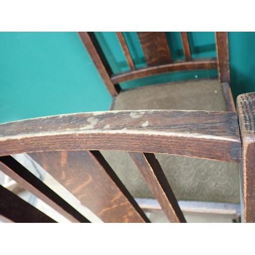 747 - A set of four oak Dining Chairs with baluster turned supports and an octagonal Table