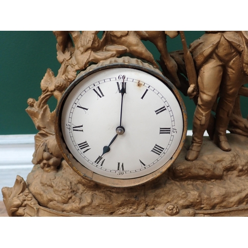 763 - A 19th Century gilded metal Mantel Clock with shooting man and hanging game surmount