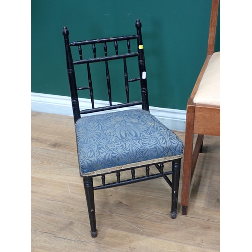 773 - Two oak Arts and Crafts Single Chairs and an ebonised child's Chair