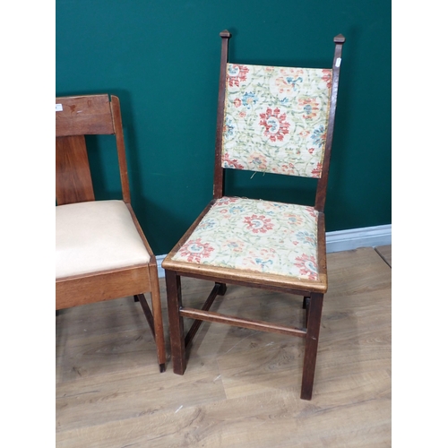 773 - Two oak Arts and Crafts Single Chairs and an ebonised child's Chair