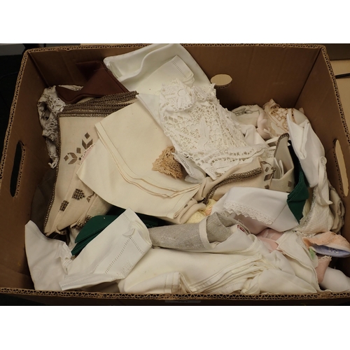 791 - A box of Linen and Metalware including Eastern brass Bowls, Candlestick, Tray, etc.