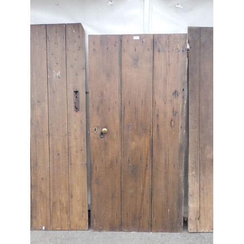 818 - An early oak Door and three other antique Doors