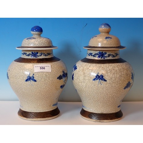 550 - A pair of Chinese blue and white crackleware lidded Vases, a Doulton stoneware Motto Jug (cracked), ... 