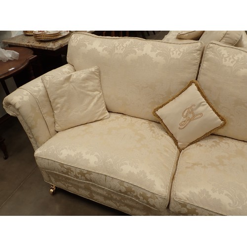 456 - A modern cream upholstered three piece Suite, consisting of a three seater Sofa 6ft 8in W x 3ft H, a... 