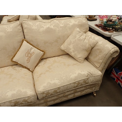 456 - A modern cream upholstered three piece Suite, consisting of a three seater Sofa 6ft 8in W x 3ft H, a... 