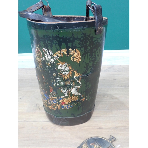 522 - A painted leather Fire Bucket with strap, 16in H, A/F and a painted metal Fire Mark