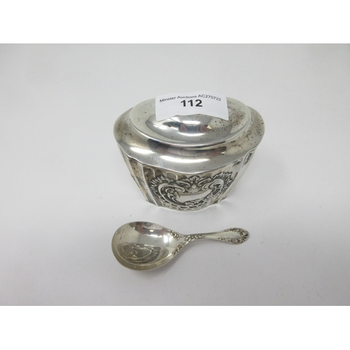 112 - A Victorian silver oval Tea Caddy, scroll embossed with hinged cover, London 1900, and a Caddy Spoon... 