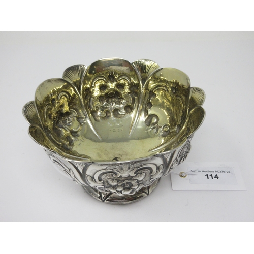 114 - A Victorian silver shaped circular Sugar Bowl with floral embossing and vacant cartouches, London 18... 