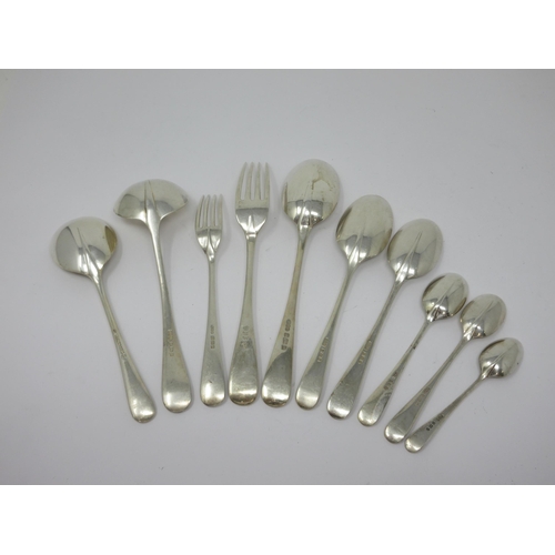 117 - An Edward VII silver Canteen of Cutlery for twelve persons, hanoverian and rat tail pattern, engrave... 