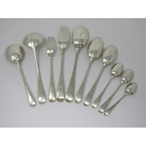 117 - An Edward VII silver Canteen of Cutlery for twelve persons, hanoverian and rat tail pattern, engrave... 