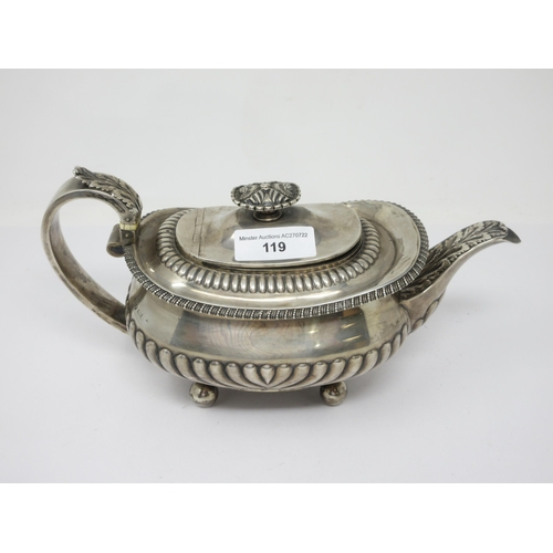 119 - A George III silver boat-shape Teapot with gadroon embossing, leafage handle and spout, flower finia... 