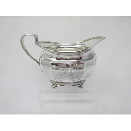 144 - An Edward VIII silver four-piece Tea Service, initial Z, raised on ball feet, Sheffield 1936, 1,957g... 