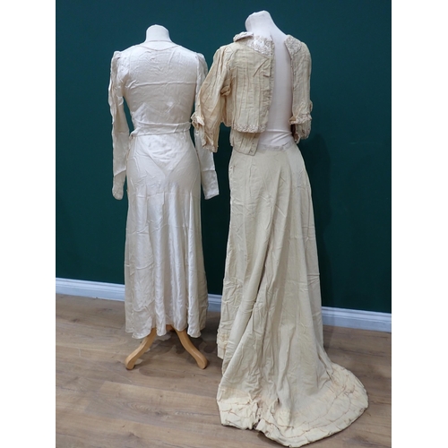 211 - An Edwardian cream Wedding Dress with embroidered satin collar, a 1930's satin bias-cut Wedding Dres... 