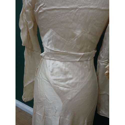 211 - An Edwardian cream Wedding Dress with embroidered satin collar, a 1930's satin bias-cut Wedding Dres... 