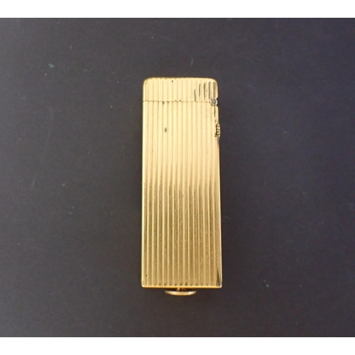 218 - A gold plated Dunhill Cigarette Lighter