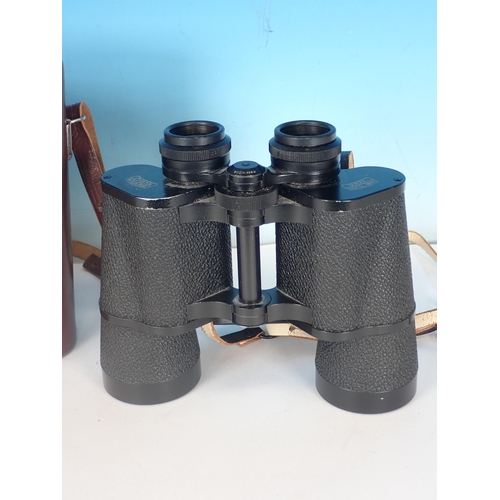 223 - A pair of Carl Zeiss Binoculars, 10x50, in leather case