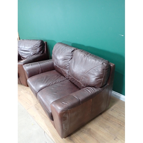 248 - A brown leather effect two seater Sofa and an Armchair