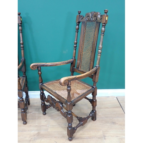 263 - A pair of Charles II style walnut Elbow Chairs with can backs and seats