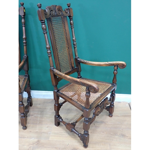 263 - A pair of Charles II style walnut Elbow Chairs with can backs and seats