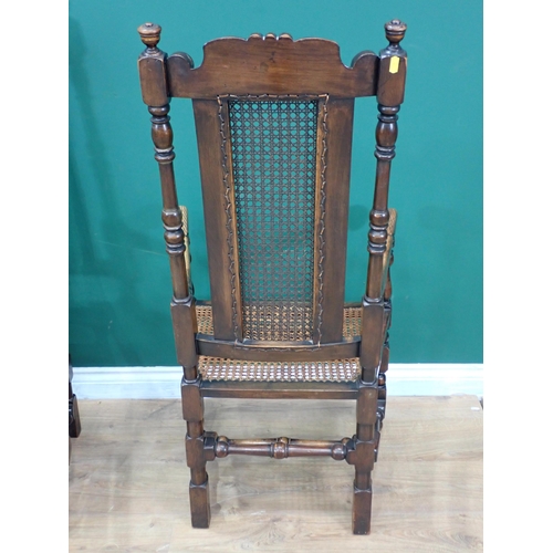 263 - A pair of Charles II style walnut Elbow Chairs with can backs and seats