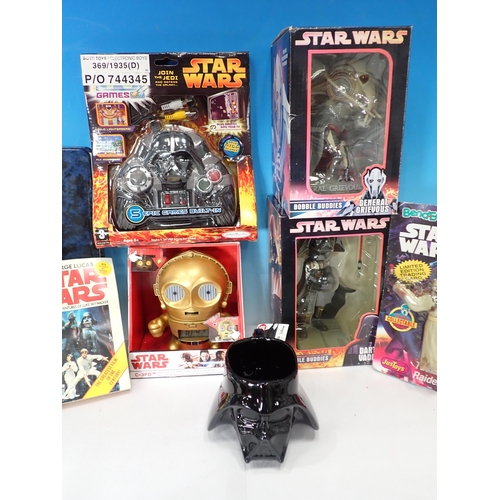 273 - Three boxes of Star Wars Bobble Buddies and other Models