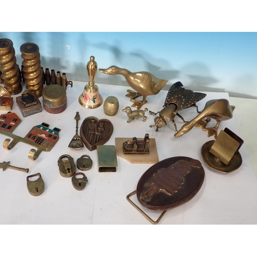 297 - A quantity of brassware including figures of birds, Mantel Clock, Inkwell, Insect Box and Cover etc