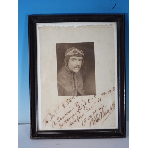 299 - A framed Photograph of a pilot with inscription referring to a passenger flight at Hereford, Septemb... 