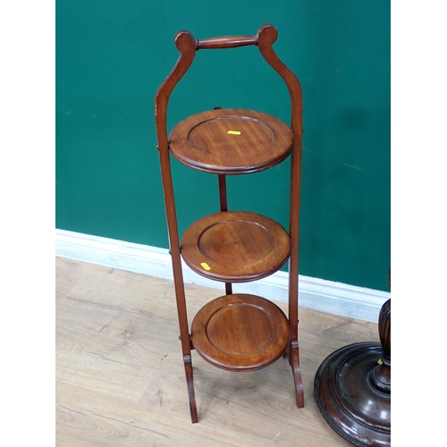 303 - An Edwardian crossbanded Pot Cupboard with squared tapering supports, a nest of three yew wood Table... 