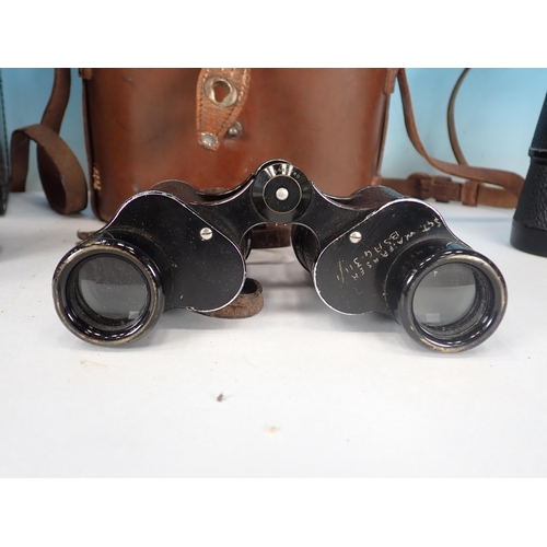 311 - A pair of Opticron water proof Binoculars, 7 x 50 and two others