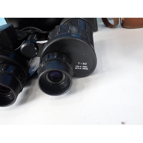 311 - A pair of Opticron water proof Binoculars, 7 x 50 and two others