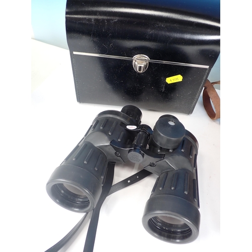 311 - A pair of Opticron water proof Binoculars, 7 x 50 and two others