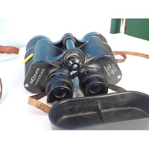 311 - A pair of Opticron water proof Binoculars, 7 x 50 and two others