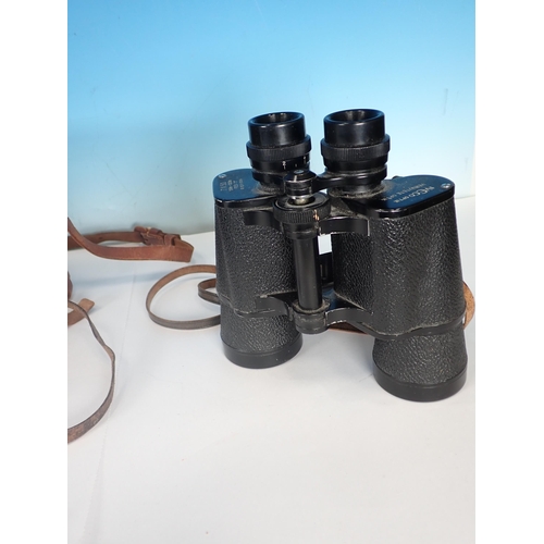 311 - A pair of Opticron water proof Binoculars, 7 x 50 and two others