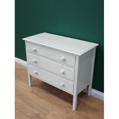 318 - A pale green painted Chest of three drawers on squared supports, 2ft 11in W x 2ft 5in H