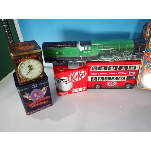 337 - Two boxes of KitKat Tins and Mugs, Biscuit Tins, a sealed Fudge tin in the form of a train and tende... 