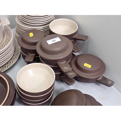 363 - A brown pottery Breakfast Services including Tureens, Plates, Bowls etc