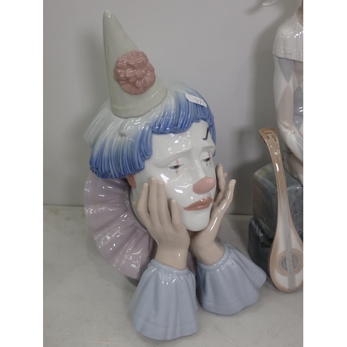 371 - A Lladro Clown Bust, a Lladro figure playing an instrument, and two Nao Figurines one A/F