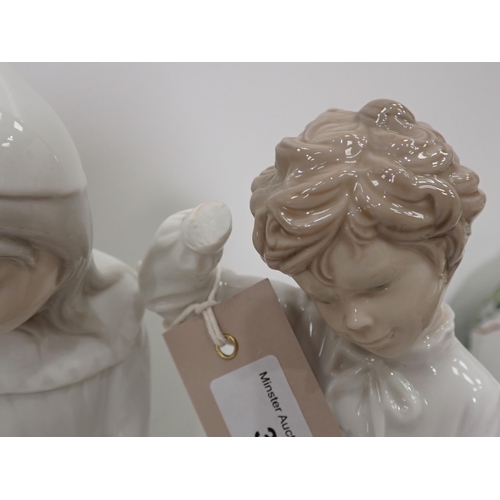 371 - A Lladro Clown Bust, a Lladro figure playing an instrument, and two Nao Figurines one A/F