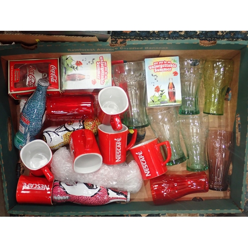 386 - A box of Coca Cola and Nescafe Mugs and Glasses and two boxes of Pint Glasses.