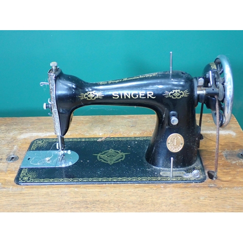 39 - A Singer Sewing Machine on stand