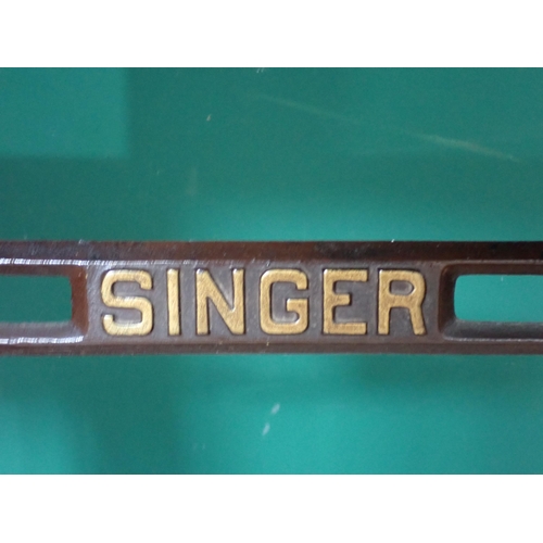 39 - A Singer Sewing Machine on stand