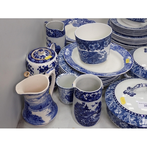 392 - An unmarked Part blue and white Dinner Service, three blue and white Jugs A/F, a spode blue and whit... 