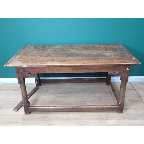 40 - An antique oak Refectory Table utilising early elements with cleated four plank top on turned suppor... 