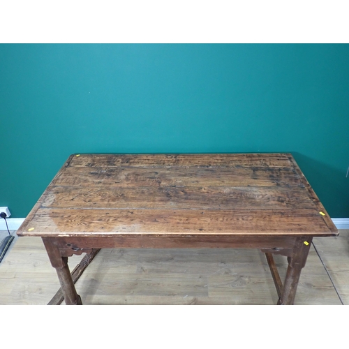 40 - An antique oak Refectory Table utilising early elements with cleated four plank top on turned suppor... 