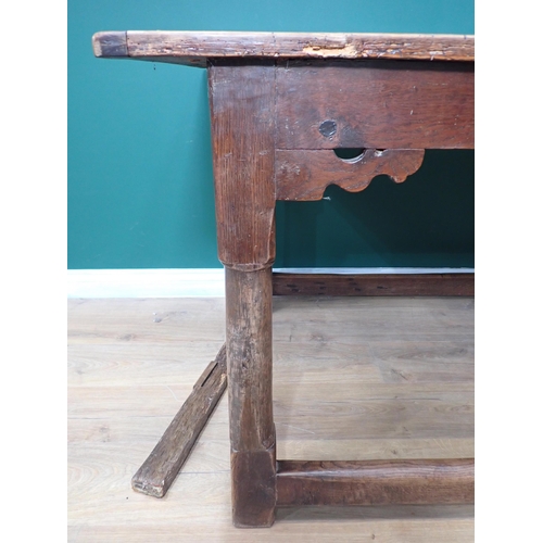 40 - An antique oak Refectory Table utilising early elements with cleated four plank top on turned suppor... 