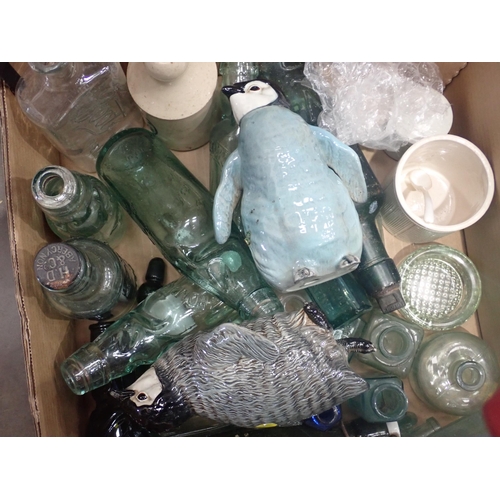 455 - Two boxes of glass and ceramics including, a collection of old glass Bottles, a Beswick Penguin Chic... 