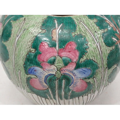 460 - An Oriental Jar and Cover with floral and leafage designs A/F.